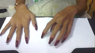 Square maroon nails writing