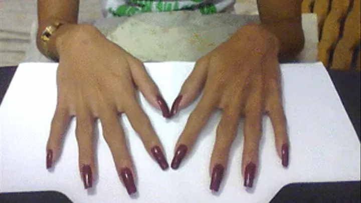 Square maroon nails in table