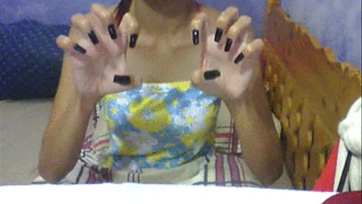 Square black nails scratching air