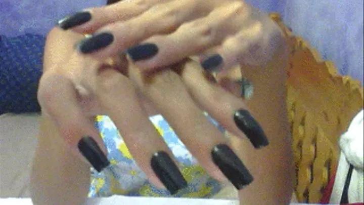 Square black nails close up