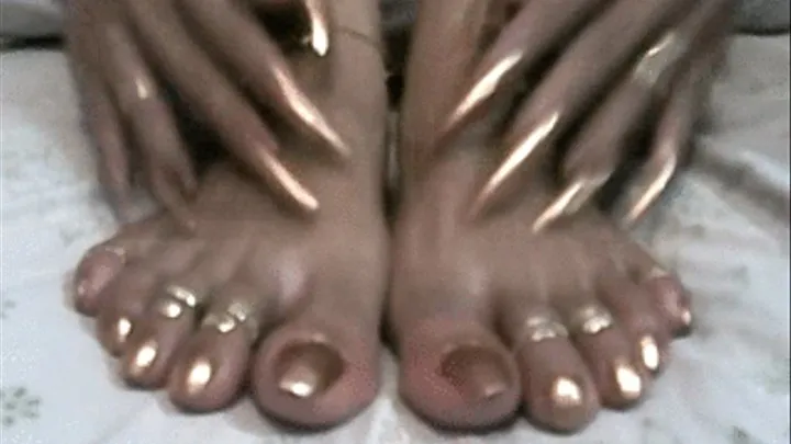 Sexy gold nails and toes..