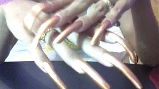 Sexy gold nails close up..