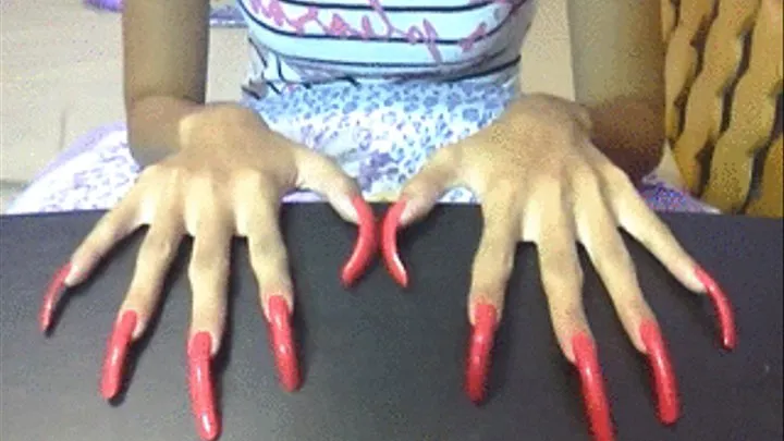 fuschia orange nails in table..