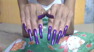 Sexy purple nails close up