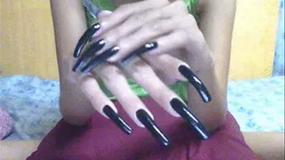 Shiny black nailss close up