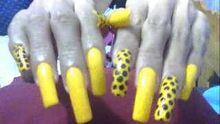 Black n yellow nails close up