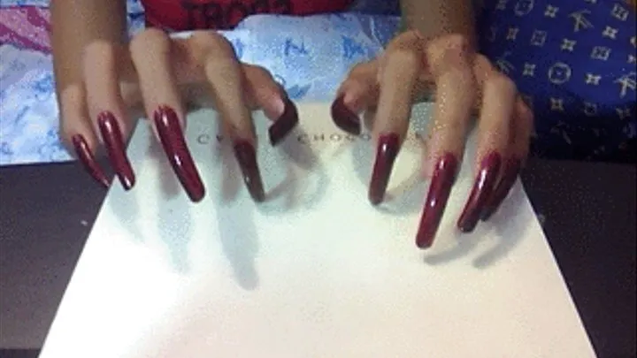 Deep red with dots nails tapping