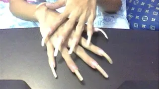 Long nails in table..