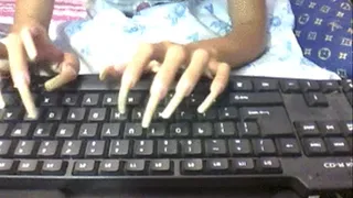 Long nails typing..