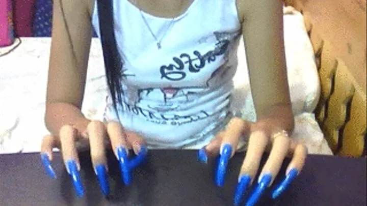 Neon blue long nails tapping..