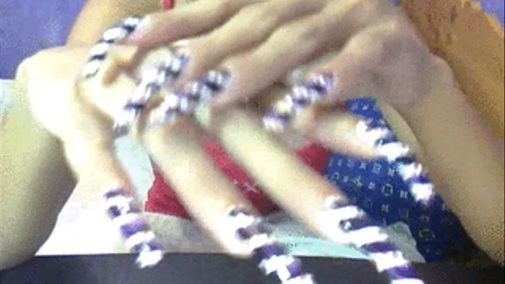 Stripes with dot nails close up..