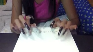 Dark brown nailss tapping..