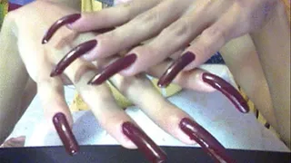 Nails maroon close up..