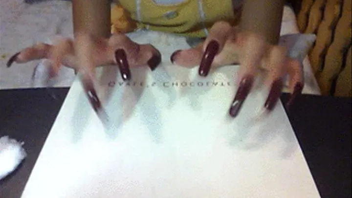 Nails maroon tapping..