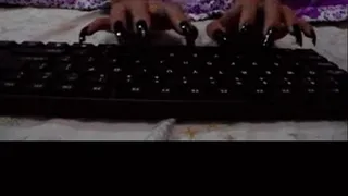 Sexy black nails typing