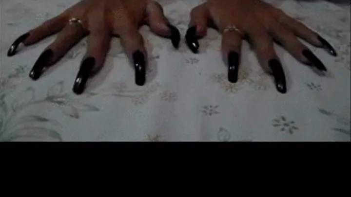 Sexy black nails in bed