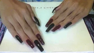 Black red nails in flat surface..