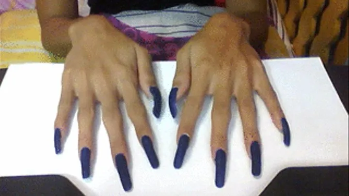 Blue velvet nails in flat surface..