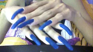 Blue velvet nails close up..