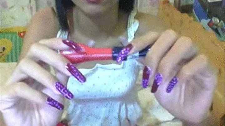 Purple with dot nails and lipstick..