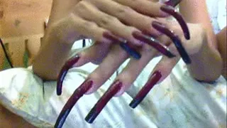 dark purple with little black nails close up