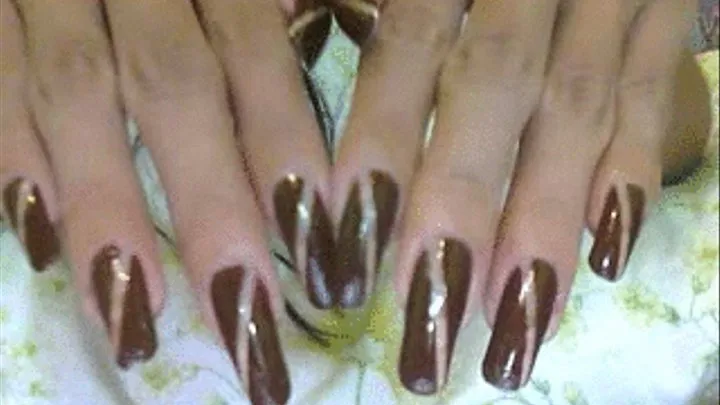 slash brown nails close up