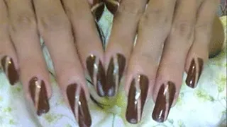 slash brown nails close up