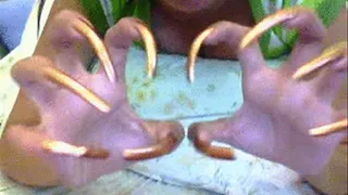 bronze gold nails scratching air