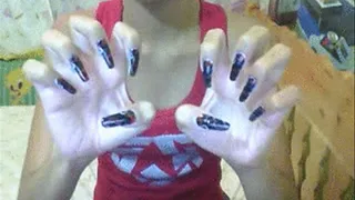 Black with heart nail art scratching air..