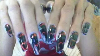 Black with heart nail art close up