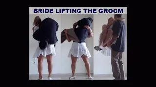 BRIDE LIFTING THE GROOM