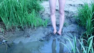 dirty feet near river