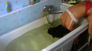 hairwashing, dunking in bath