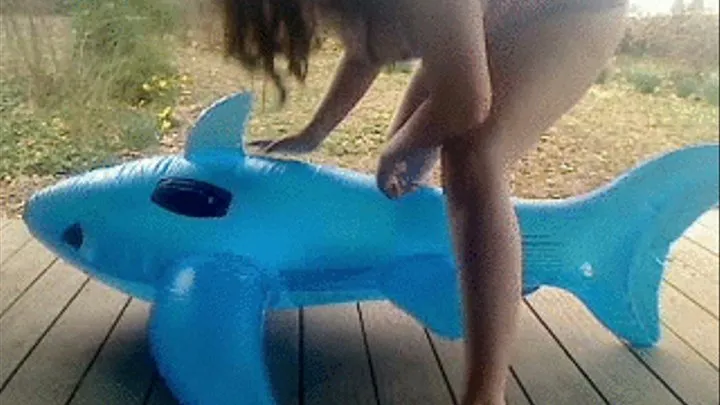 Mikki Rides the Shark