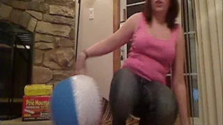 Mikki Tries to Pop the Beach Ball