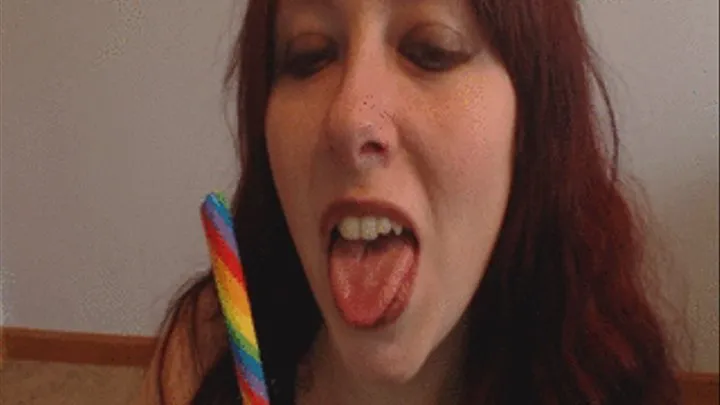 Beautiful Tongue Licks Colorful Candy Stick