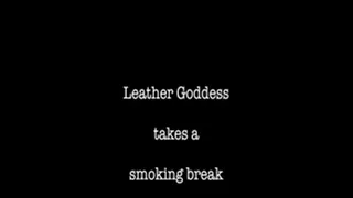 Leather Mistress takes a smoking break
