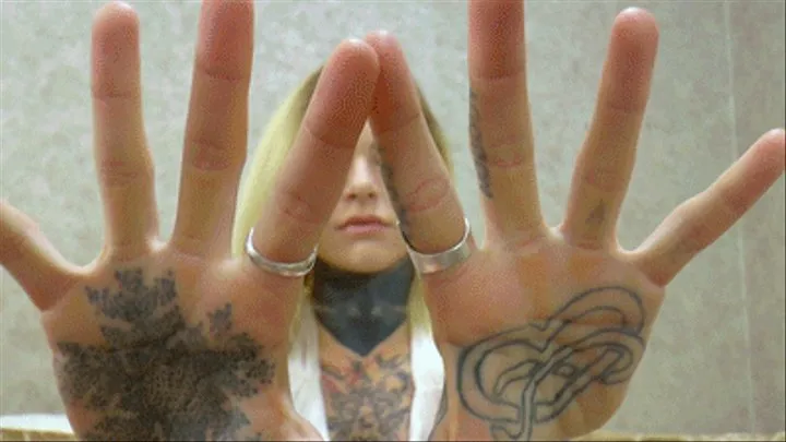 Soft and tattooed hands