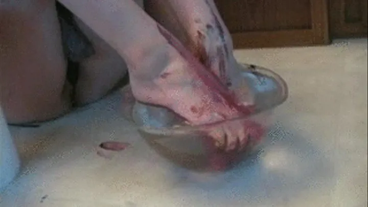 Nickie washes her feet