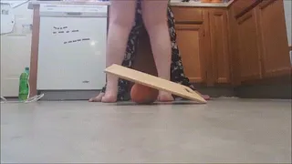 Big Booty Squishing A Grapefruit Under A Cutting Board