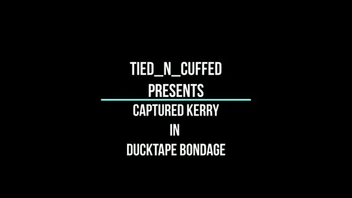 Captured Kerry in Ducktape Bondage