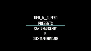 Captured Kerry in Ducktape Bondage