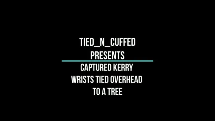 Captured Kerry Wrists Tied Overhead to a Tree