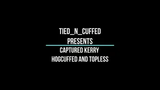 Captured Kerry Hogcuffed and Topless