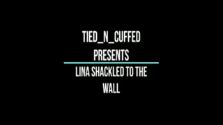Lina Shackled to the wall