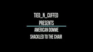 American Domme Shackled To The Chair