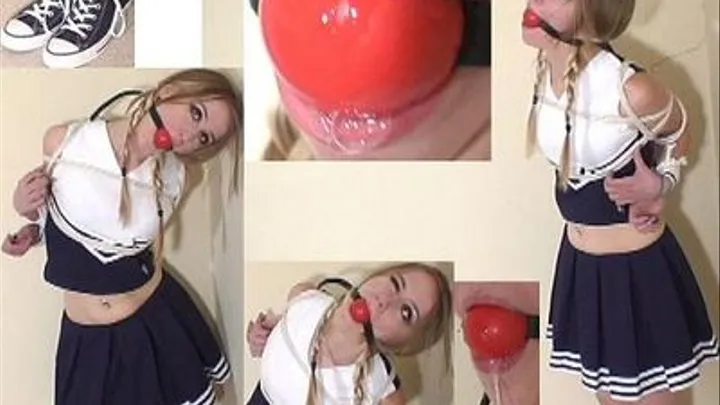 Cheer leader ball gagged and drooling