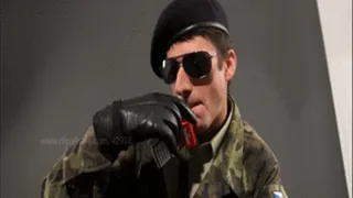 SOLDIER IN LEATHER GLOVES SMOKES ON YOU
