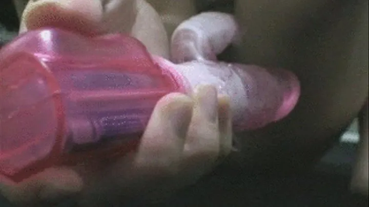 Pink dildo inserted inside lady's pussy resulted to yellowish stain on panty