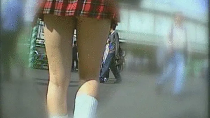 Lady In Short Tartan Skirt Has Her Underwear Peeking Out!